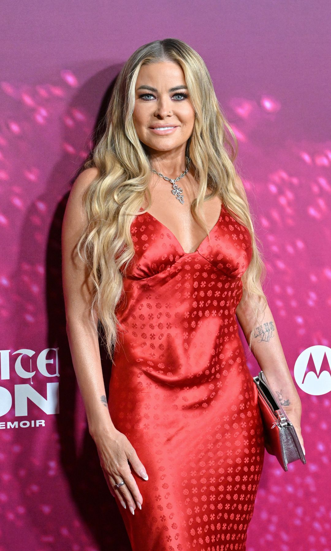 Carmen Electra arm tattoos