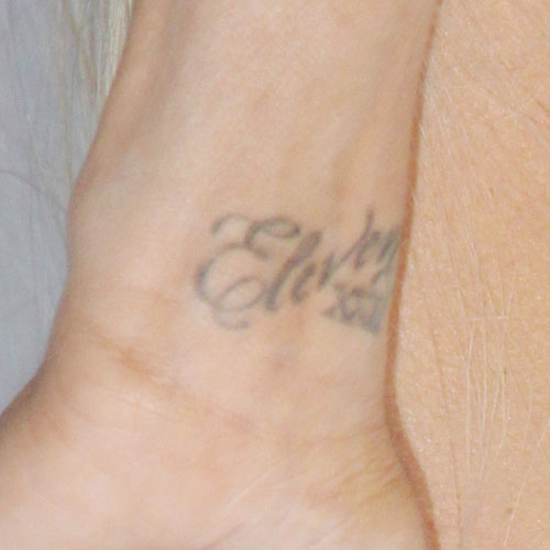 Carmen Electra wrist tattoo