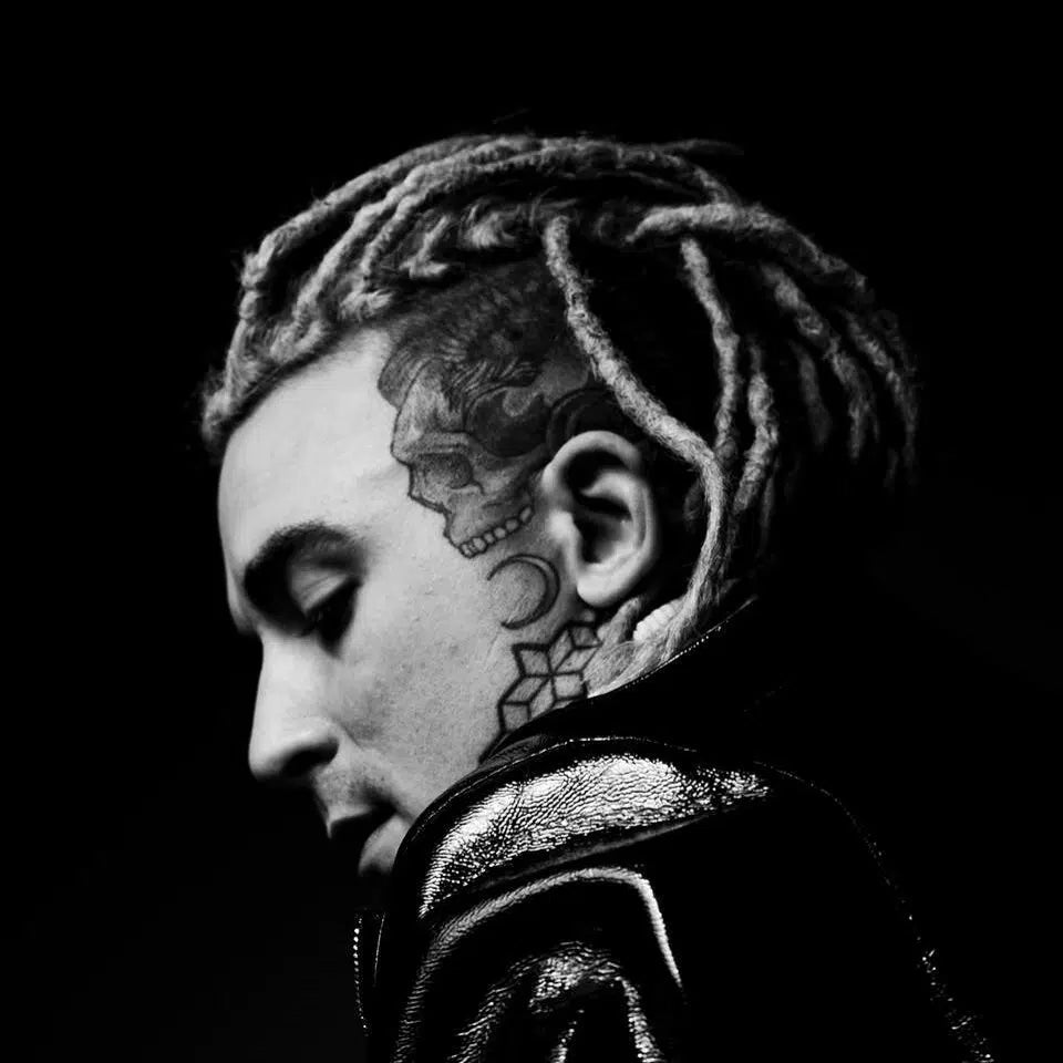 Caskey tattoos: high-resolution side profile showing the head, face and neck tattoo layout