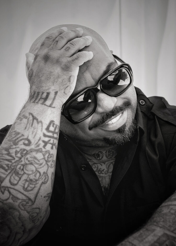 CeeLo Green hand and forearm tattoos