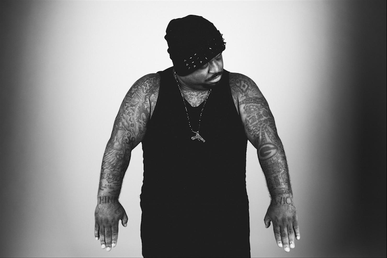 CeeLo Green hand and chest tattoos