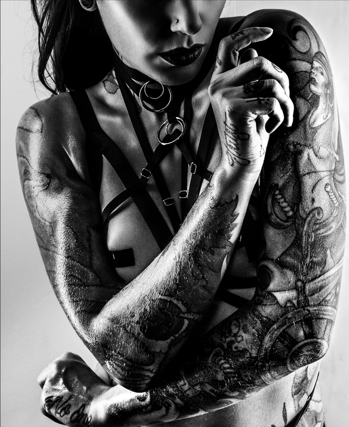 Cervena Fox pirate portrait and roses on her left arm Cervena Fox tattoos: Pirate portrait and roses on her left arm