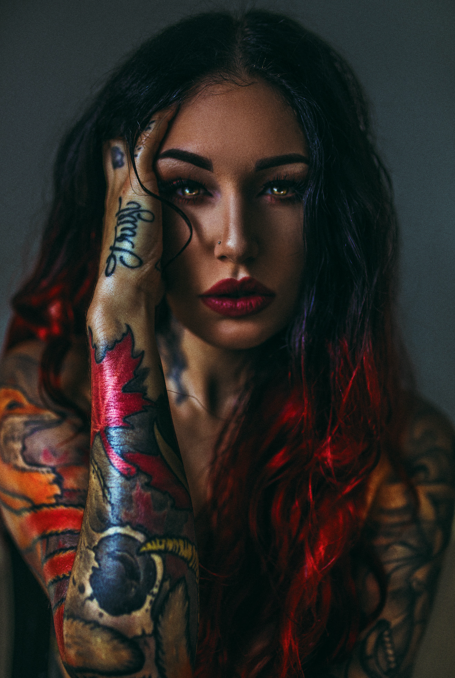 Cervena Fox red maple leaf on her right forearm Cervena Fox tattoos: Red maple leaf on her right forearm