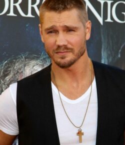 Chad Michael Murray Tattoos: Wrist Cross and Shoulder Ink