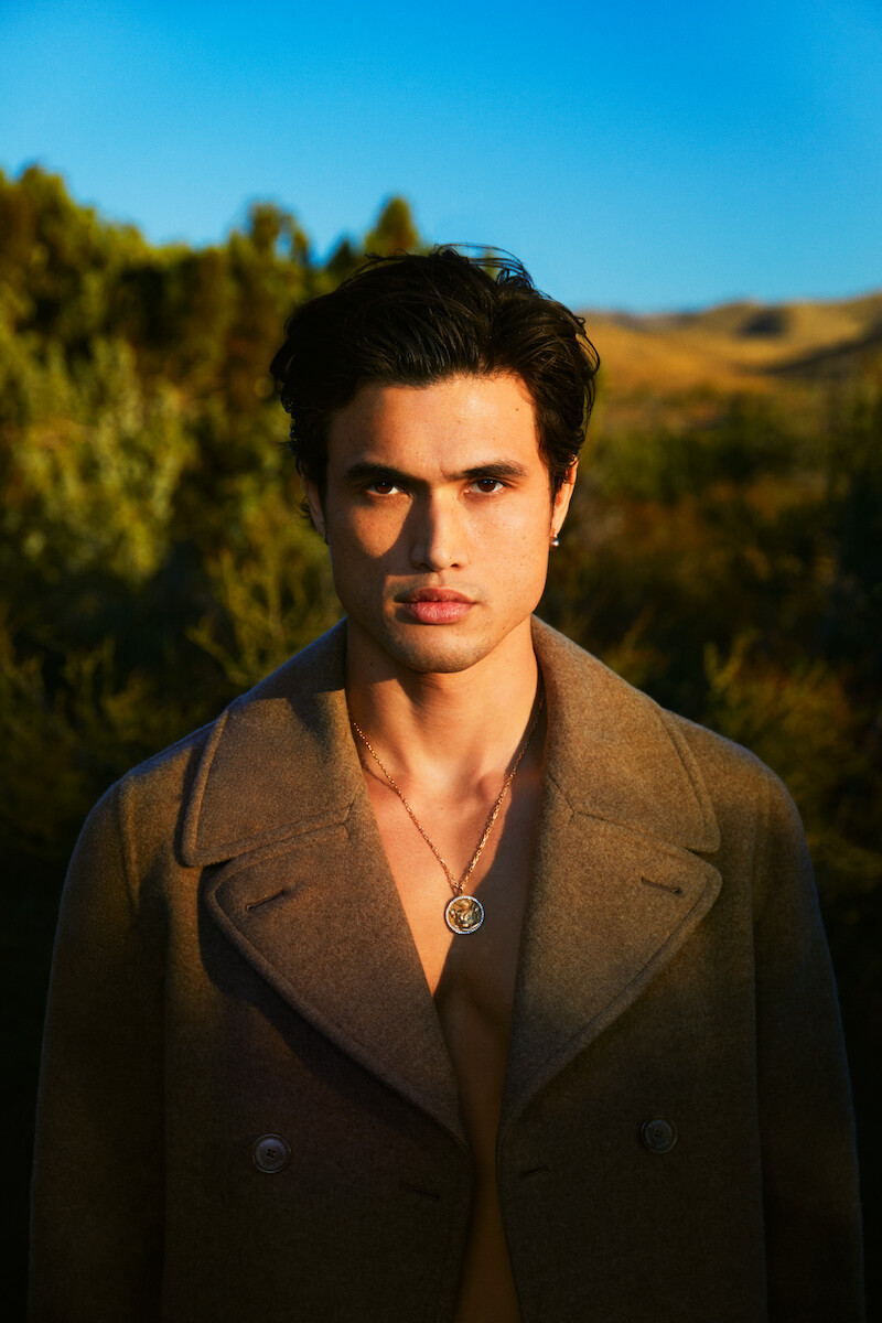 Charles Melton in a contextual photograph: contextual portrait, not tattoo evidence; not tattoo evidence