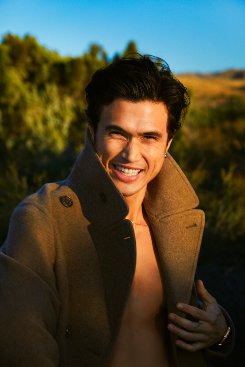 Charles Melton in a contextual photograph: contextual portrait, not tattoo evidence; not tattoo evidence