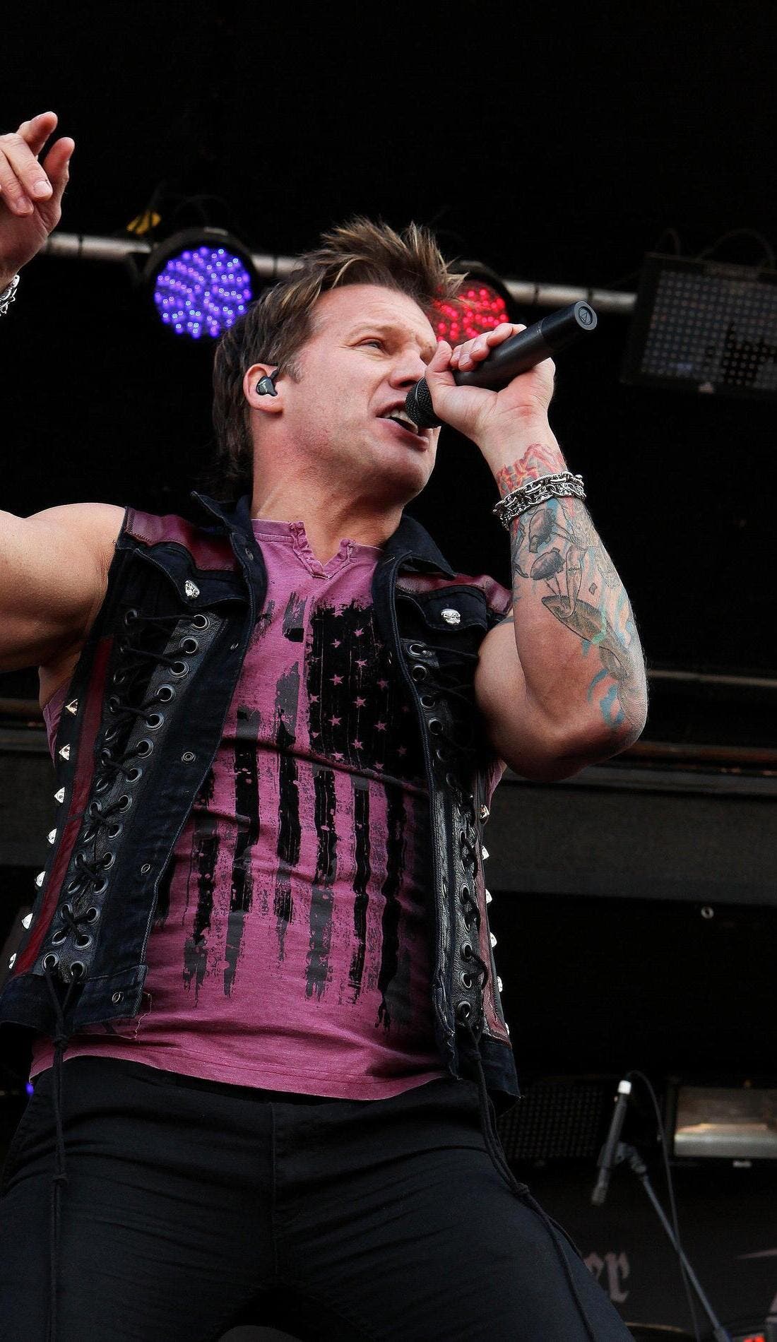 Chris Jericho tattooed arm and upper body