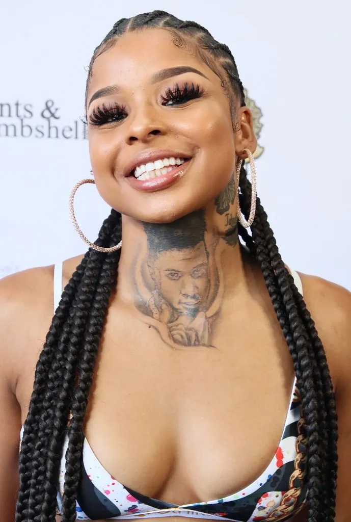 Chrisean Rock tattoos: Large face portrait, heavy shading and surrounding lettering