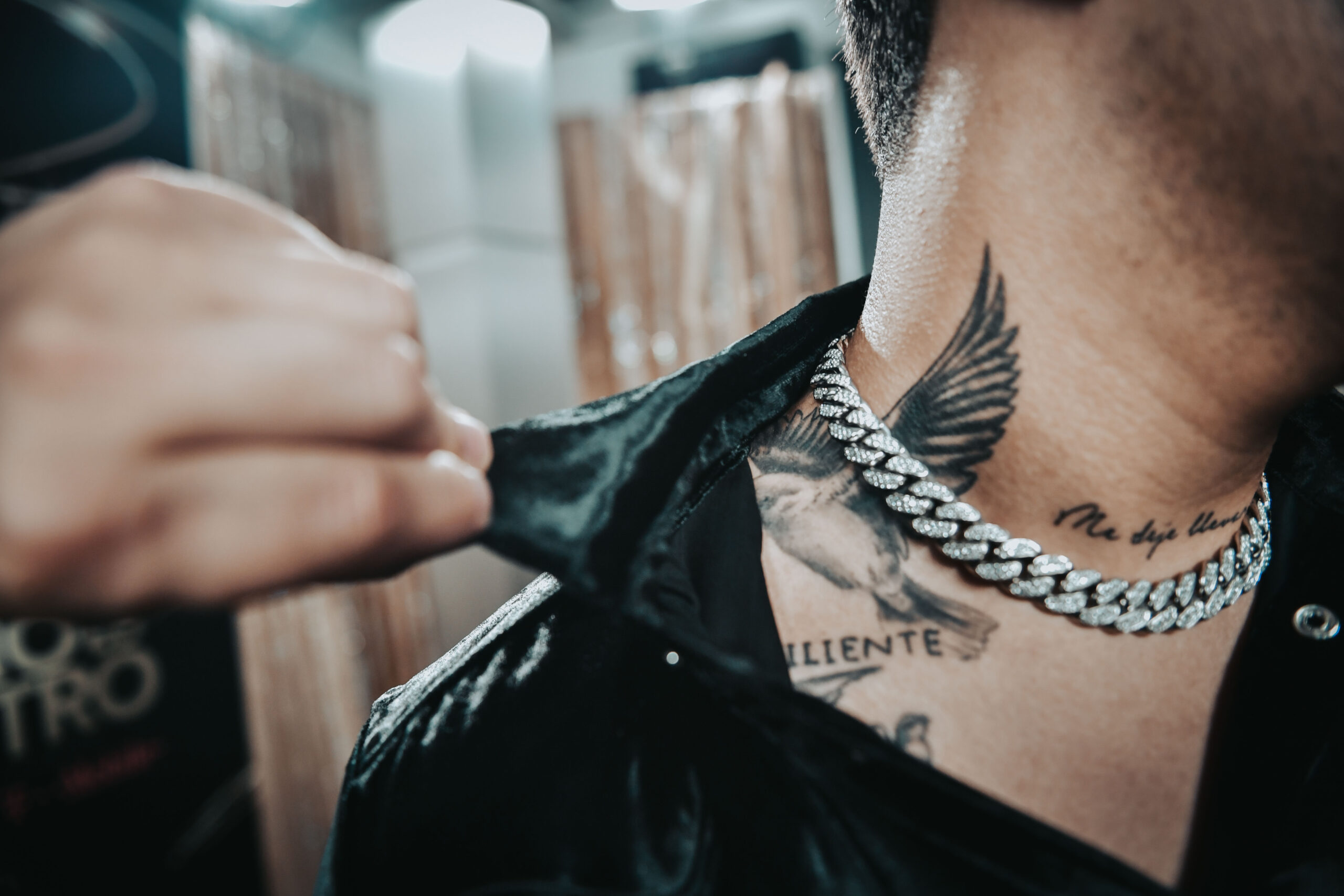 Christian Nodal tattoos: chest tattoo and upper body placement