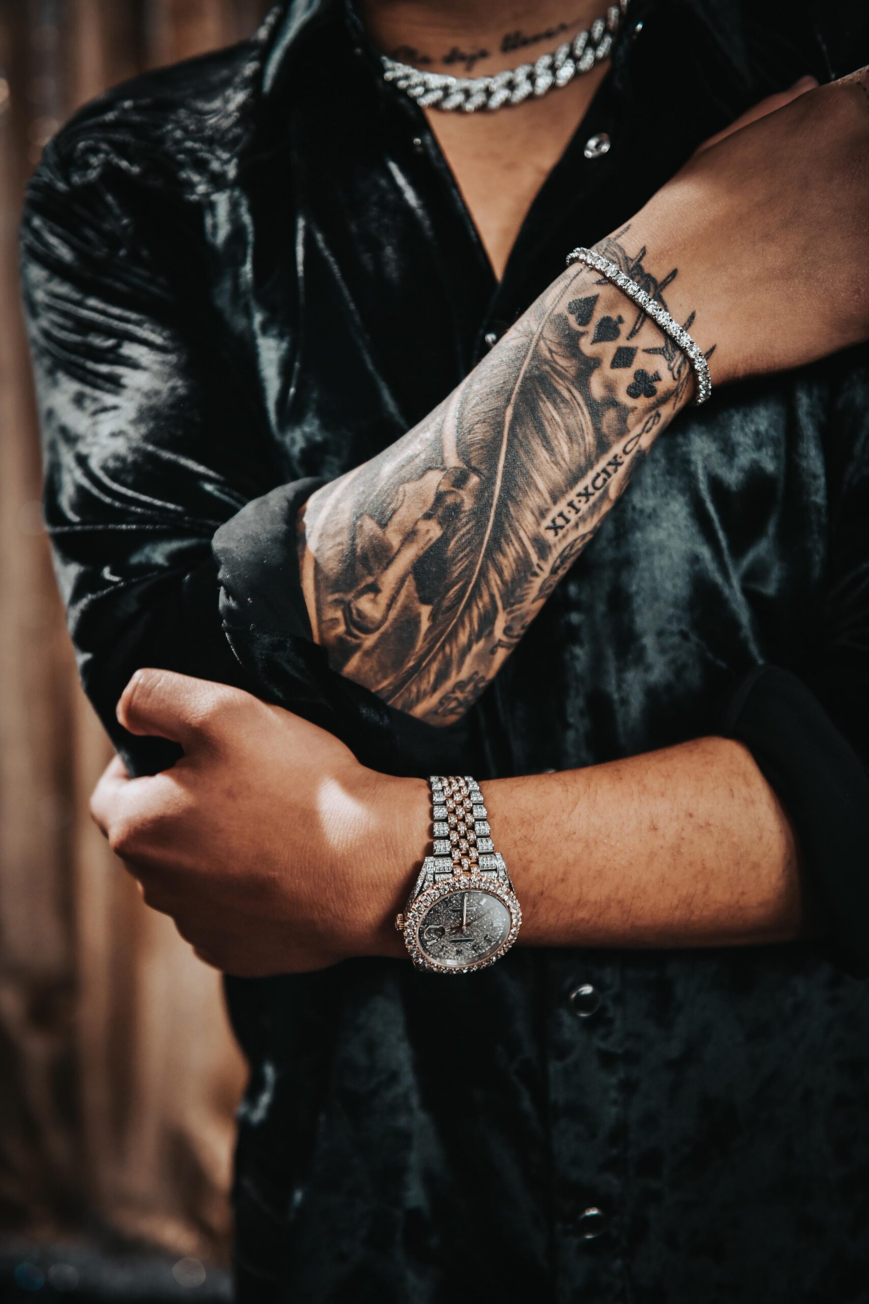 Christian Nodal tattoos: close forearm blackwork and line detail