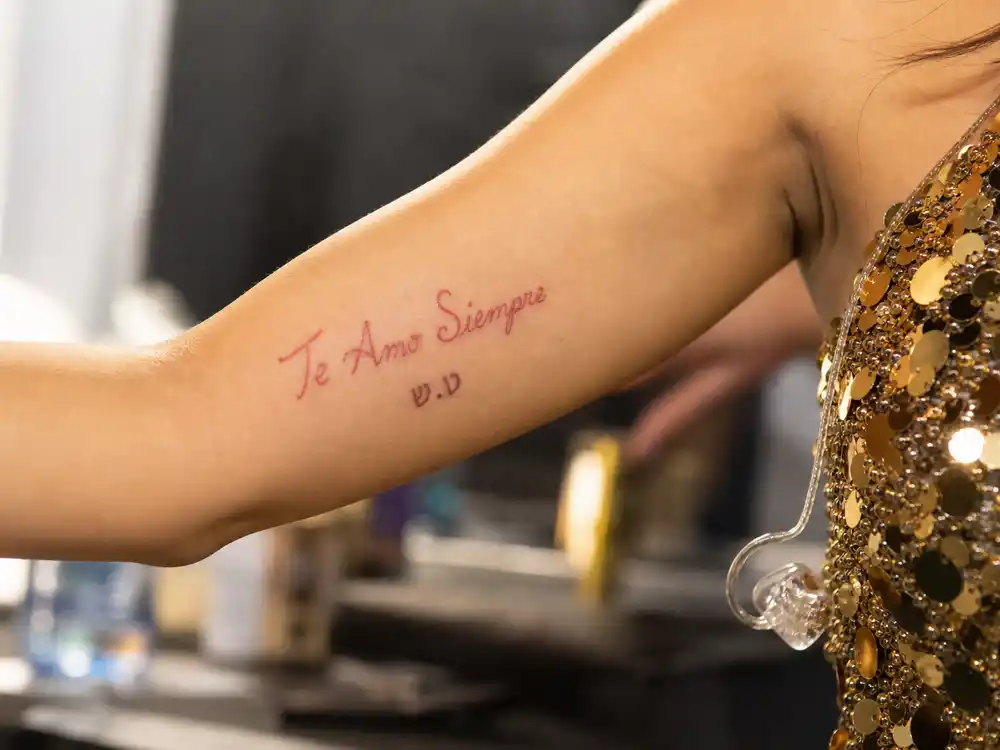 Christina Aguilera Te Amo Siempre elbow tattoo