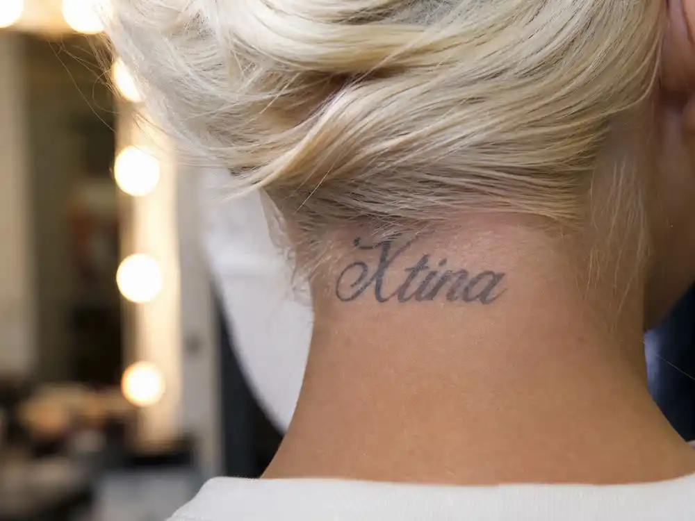 Christina Aguilera Xtina neck tattoo