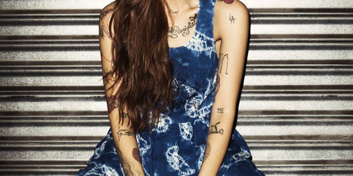 Christina Perri tattooed arms and chest