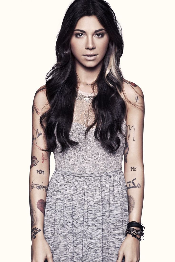 Christina Perri arm and chest tattoos