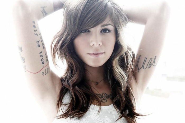 Christina Perri tattoos on arms and chest