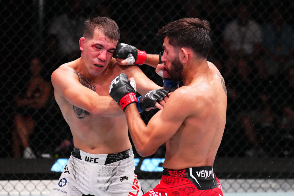 Cody Durden in a contextual photograph: The work behind the UFC call; not tattoo evidence