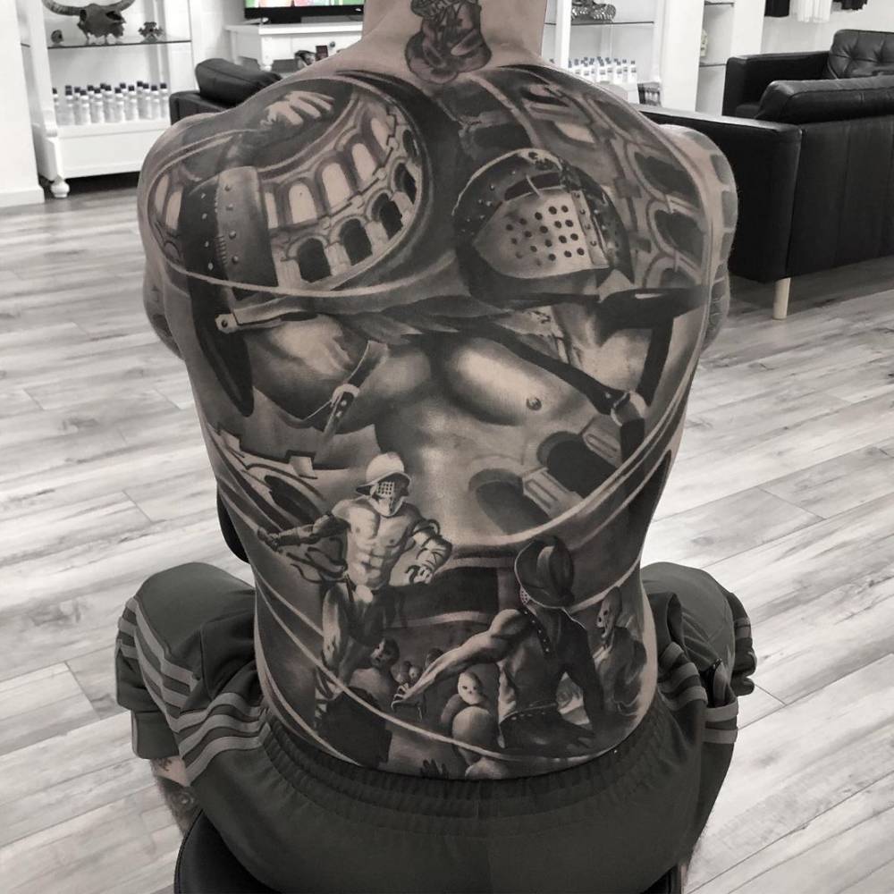 Cody Garbrandt full backpiece tattoo