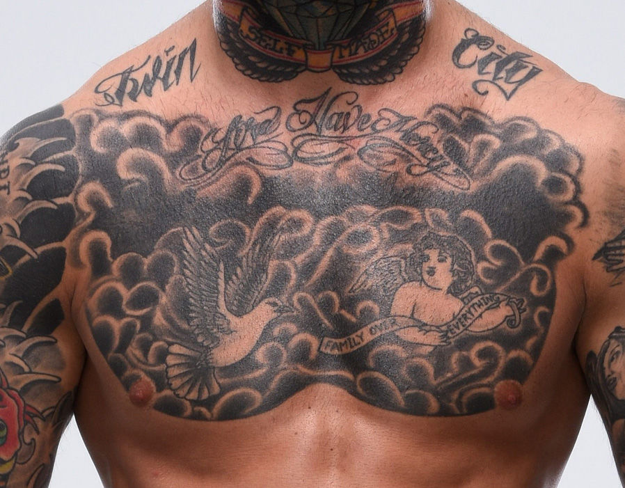 Cody Garbrandt Family Over Everything chest tattoo