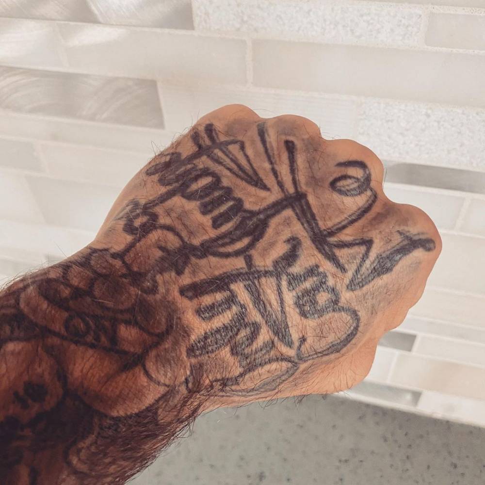 Cody Garbrandt hand tattoo close-up