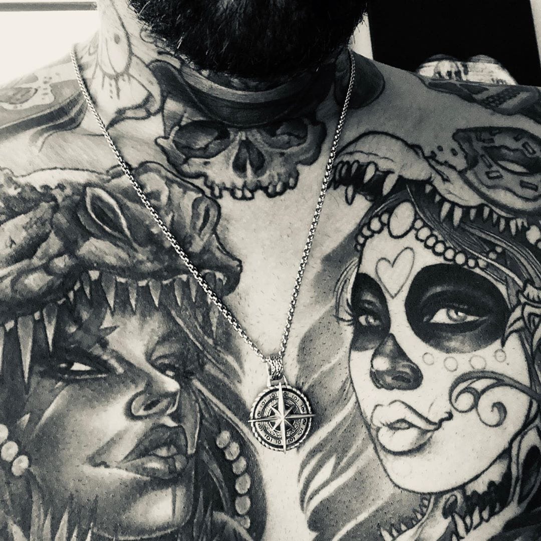 Corey Graves tattoos: separate front-facing photograph showing the chest portraits and surrounding designs