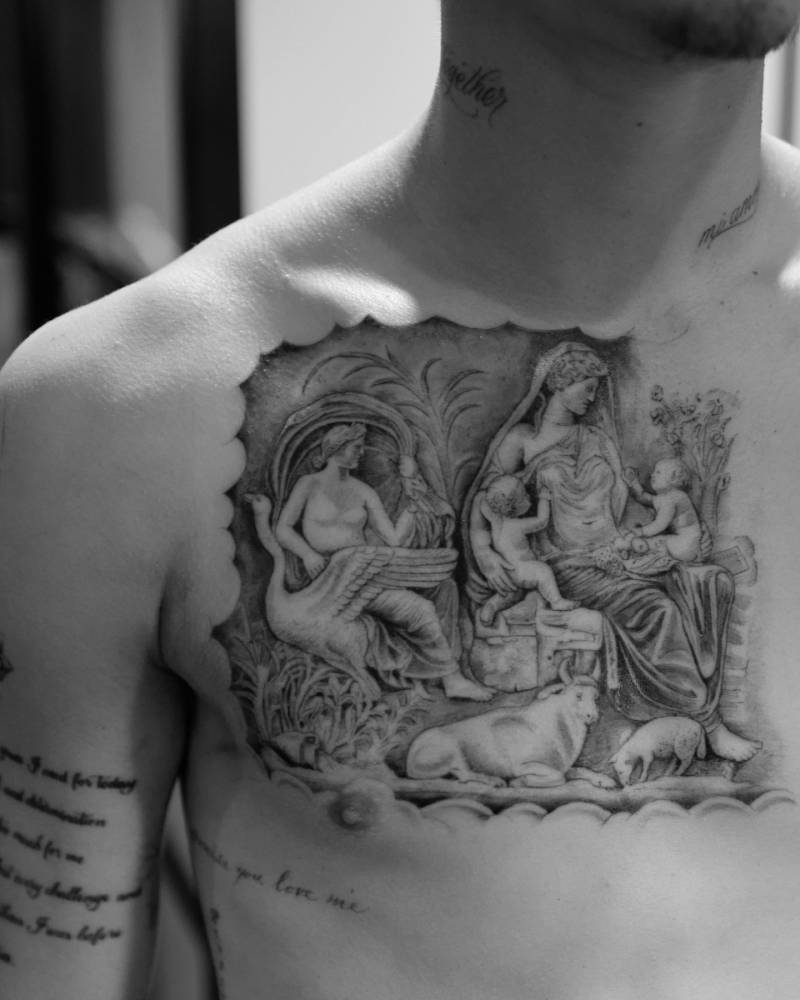 Romeo Beckham chest classical scene tattoo