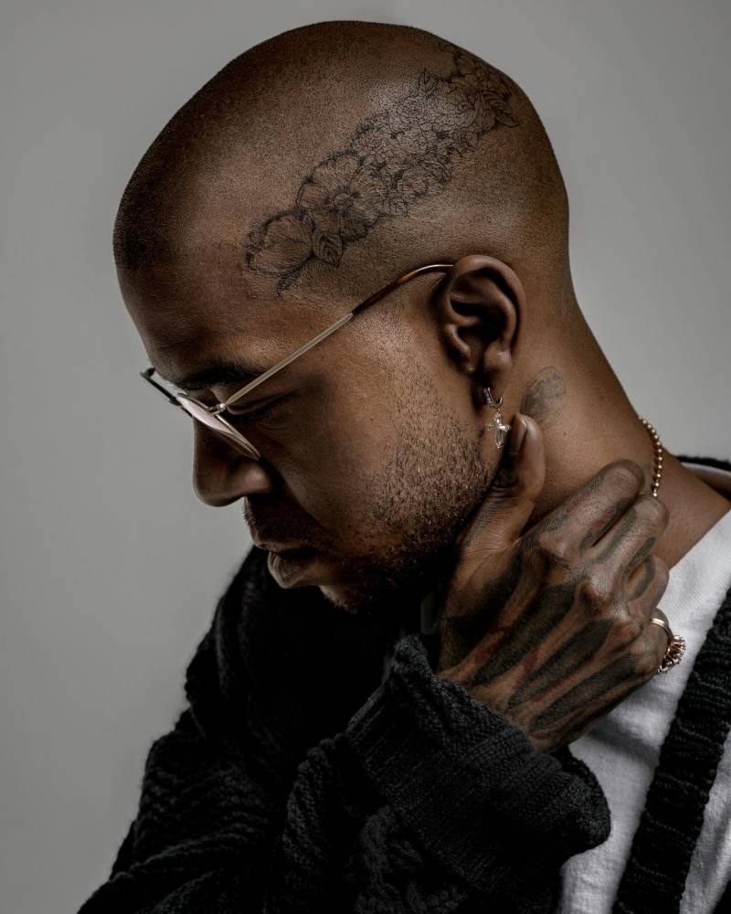 Kid Cudi floral head tattoo