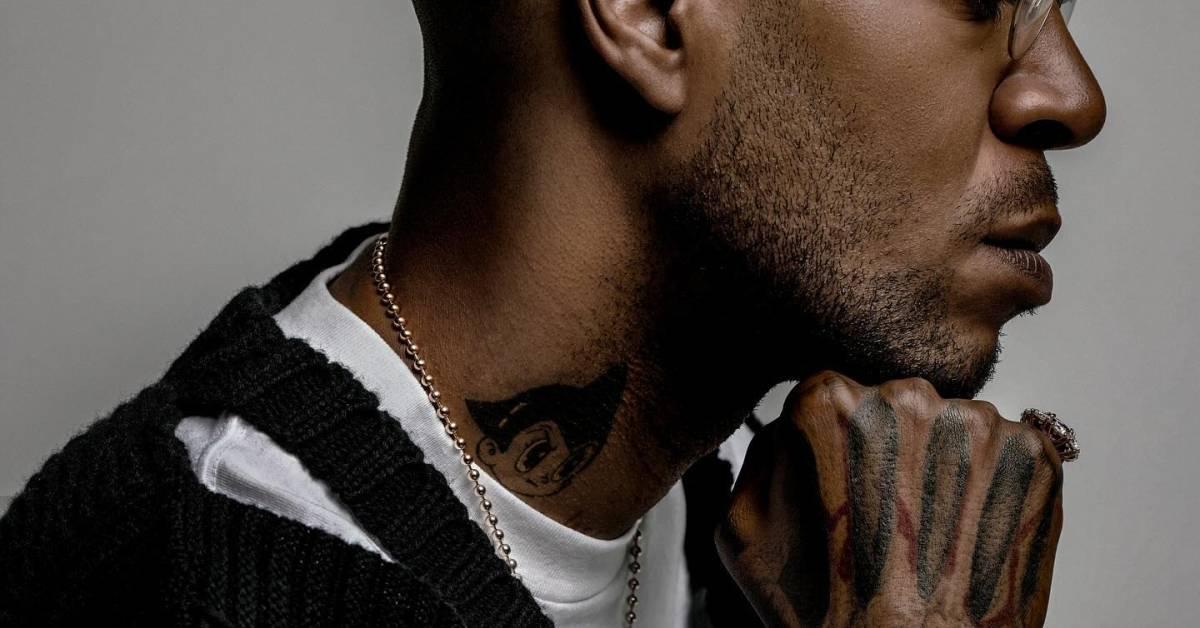Kid Cudi hand and neck tattoo close-up