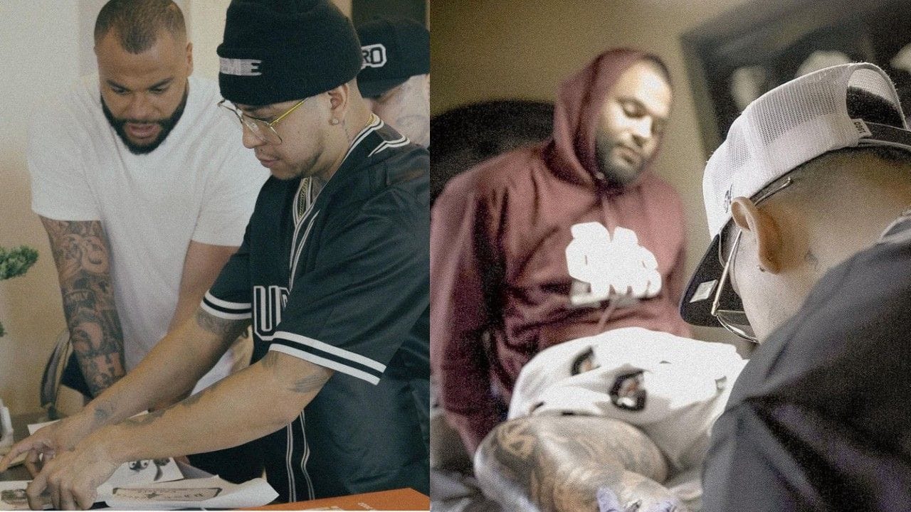 Dak Prescott during the process of getting his leg tattoo