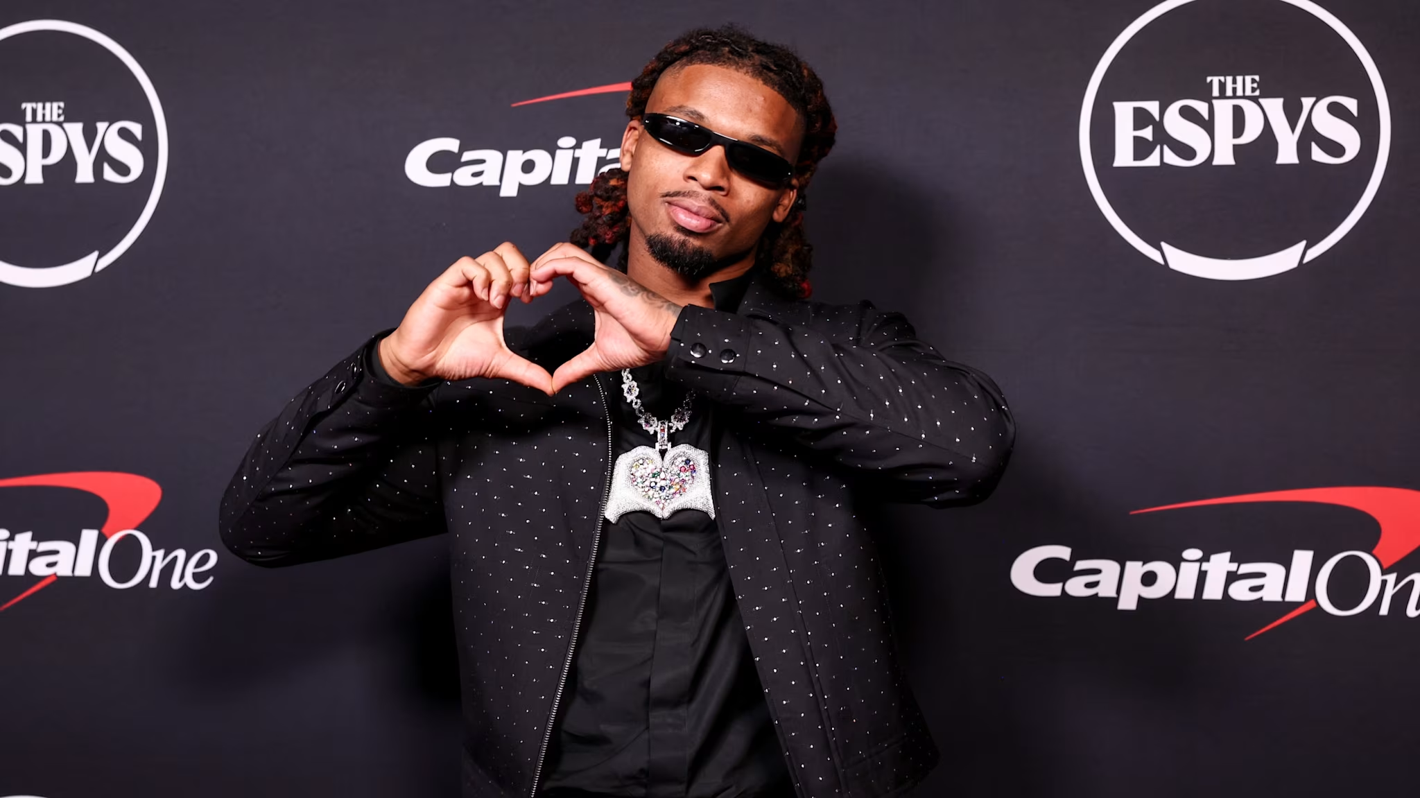 Damar Hamlin in a contextual photograph: red-carpet context; not tattoo evidence