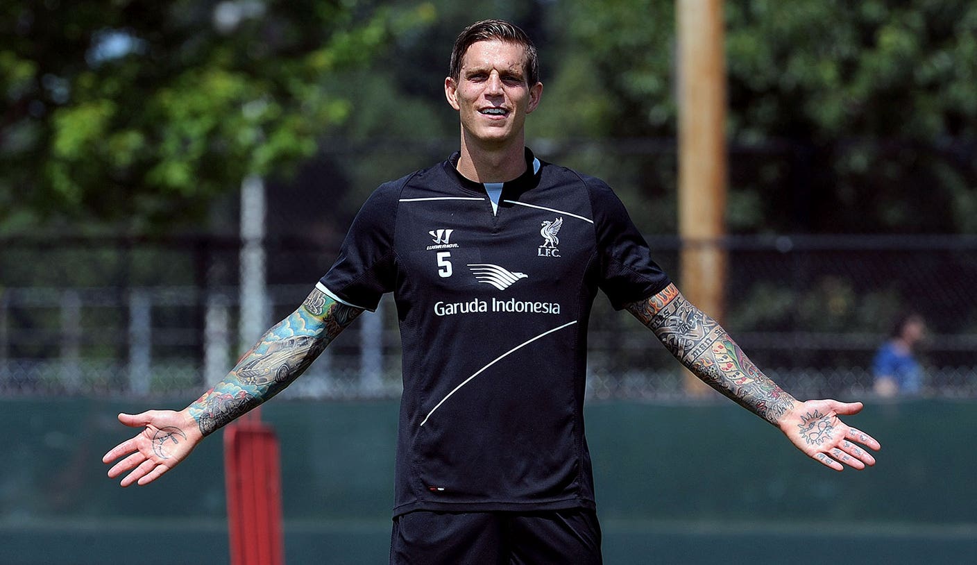 Daniel Agger tattoos: clear view of Daniel Agger's extensive arm sleeves and hand ink