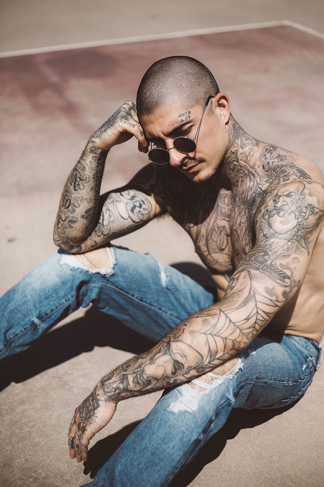 Daniel Bamdad tattoos: Left sleeve figures and the elbow spiderweb