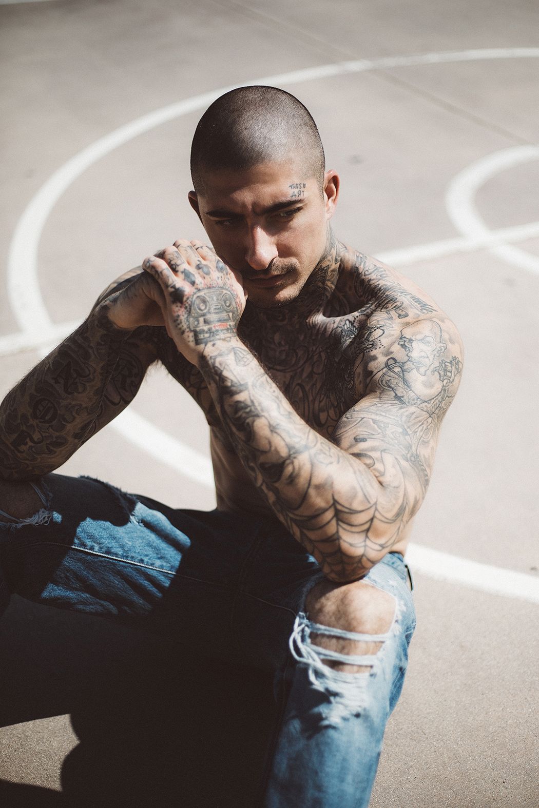 Daniel Bamdad tattoos: Hand tattoos and the mechanical face