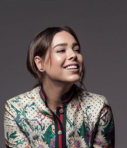 Danna Paola Tattoos: Grandmother Tribute, Red Kiss and Fine-Line Ink