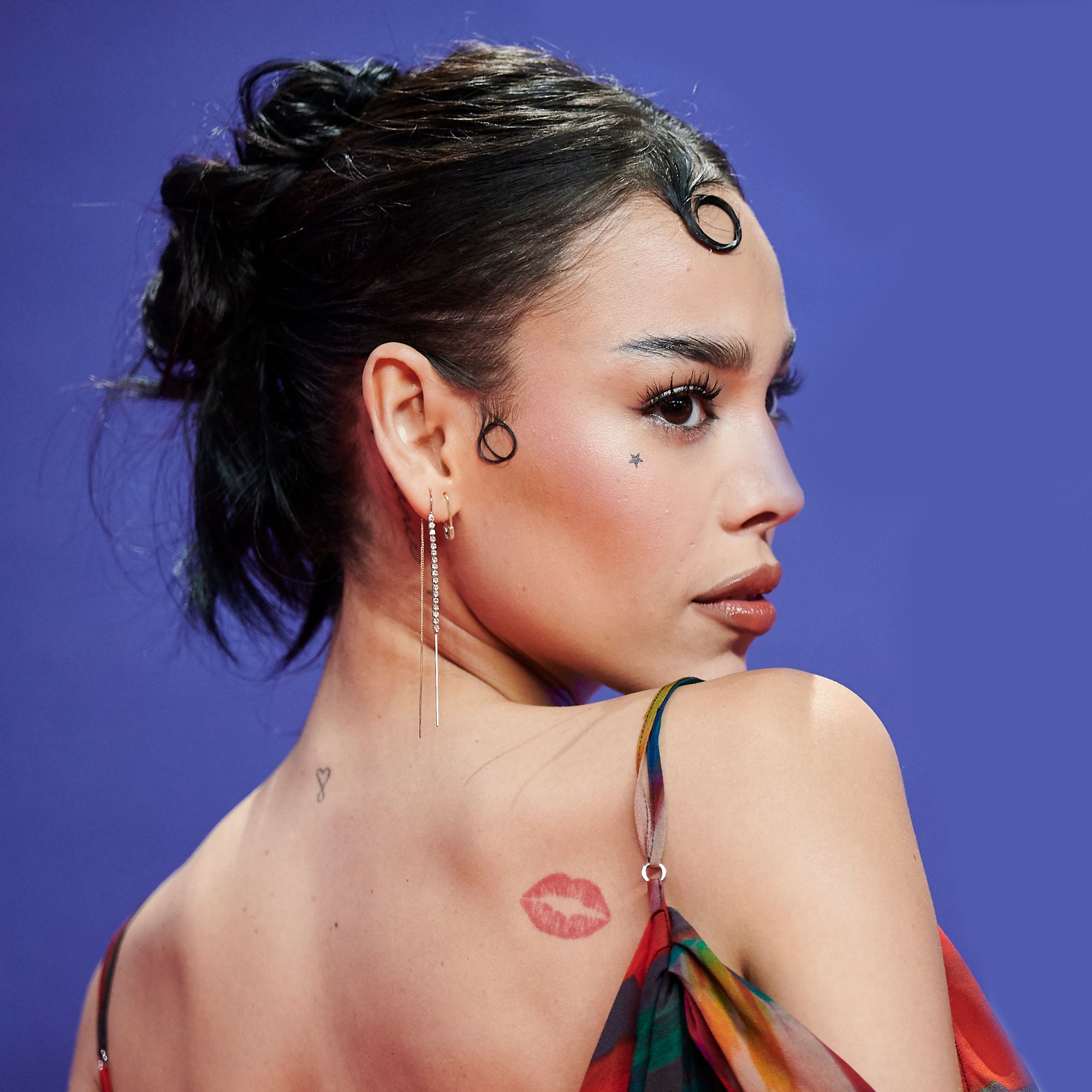 Danna Paola tattoos: red kiss tattoo close-up