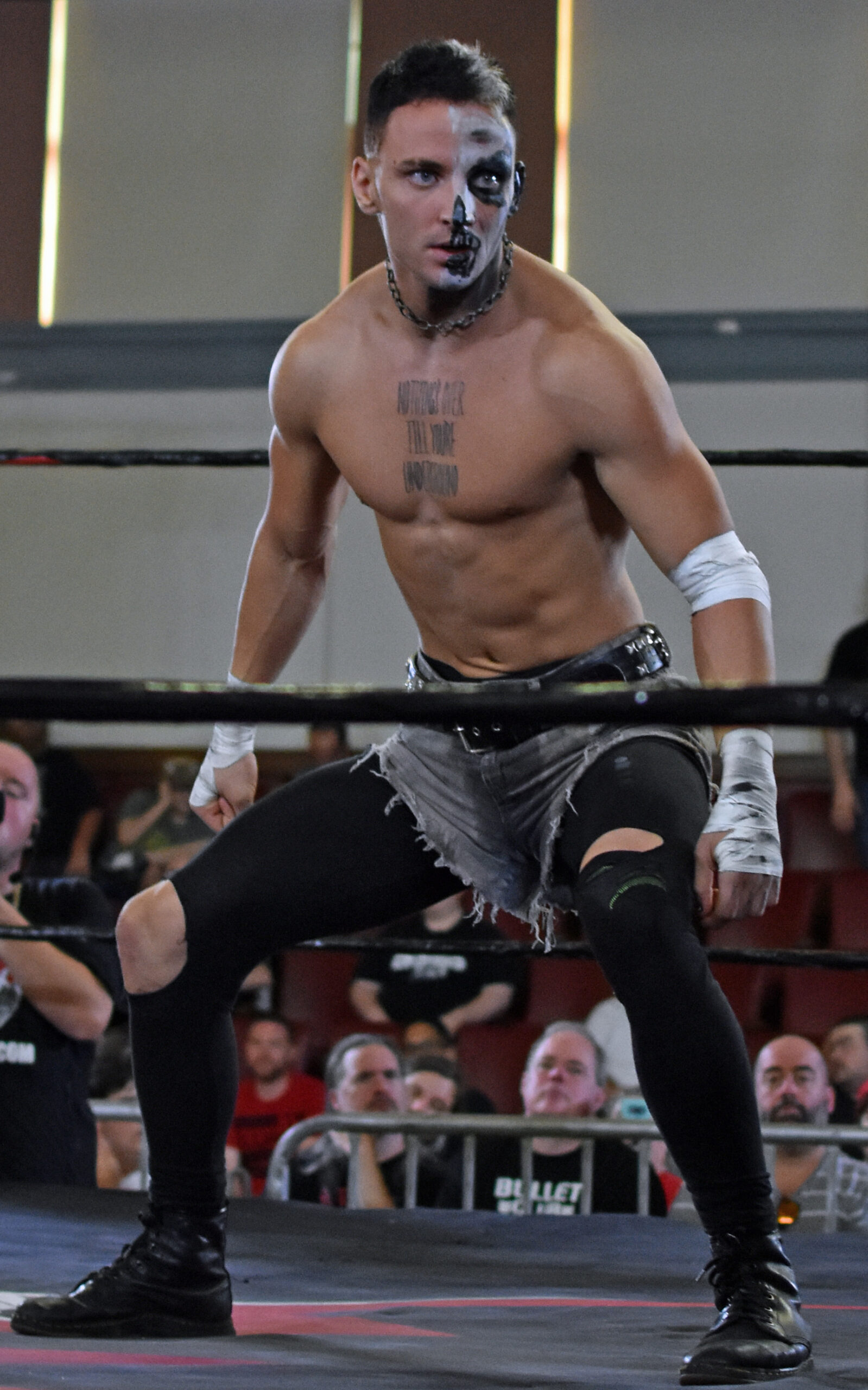 Darby Allin tattoos: clean licensed full-body view of Darby's Nothing's Over Till You're Underground chest quote