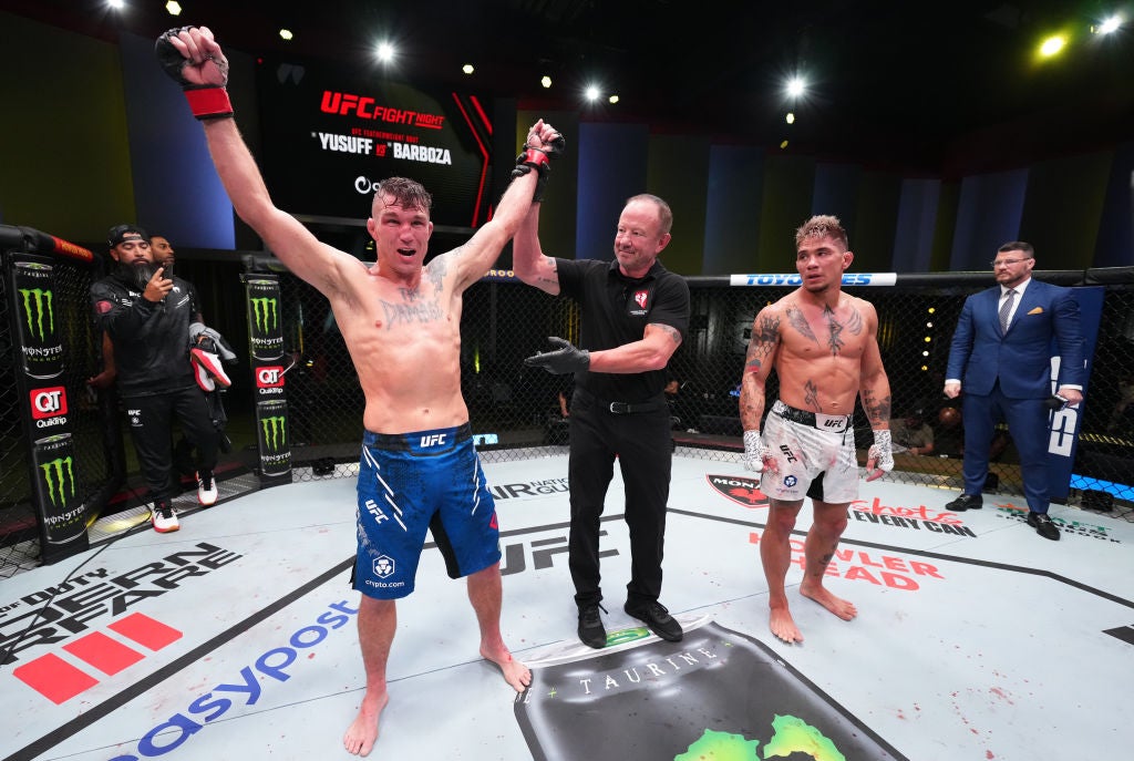 Darren Elkins in a contextual photograph: The result against TJ Brown; not tattoo evidence
