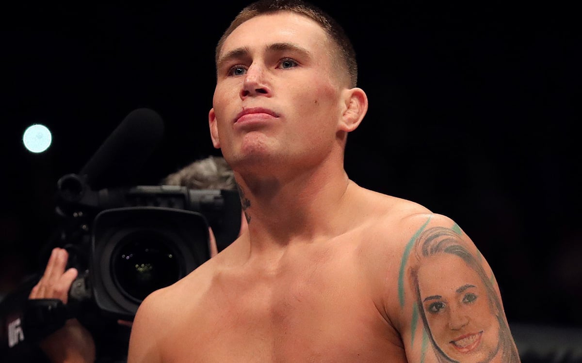 Darren Till showing his original girlfriend portrait arm tattoo
