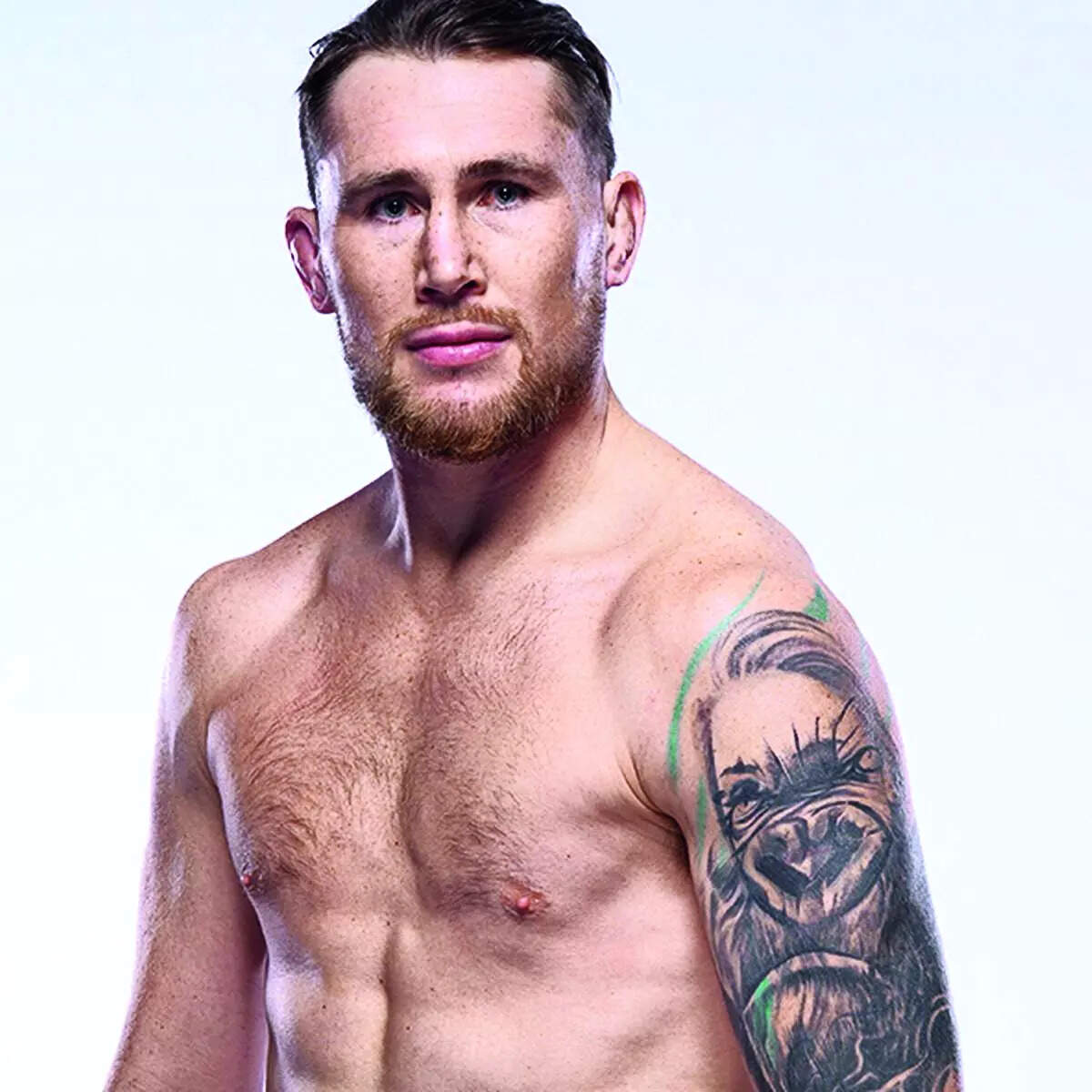 Darren Till showing the detail of his gorilla cover-up tattoo