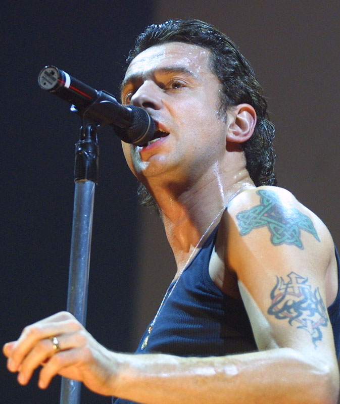Dave Gahan shoulder cross and arm tattoos