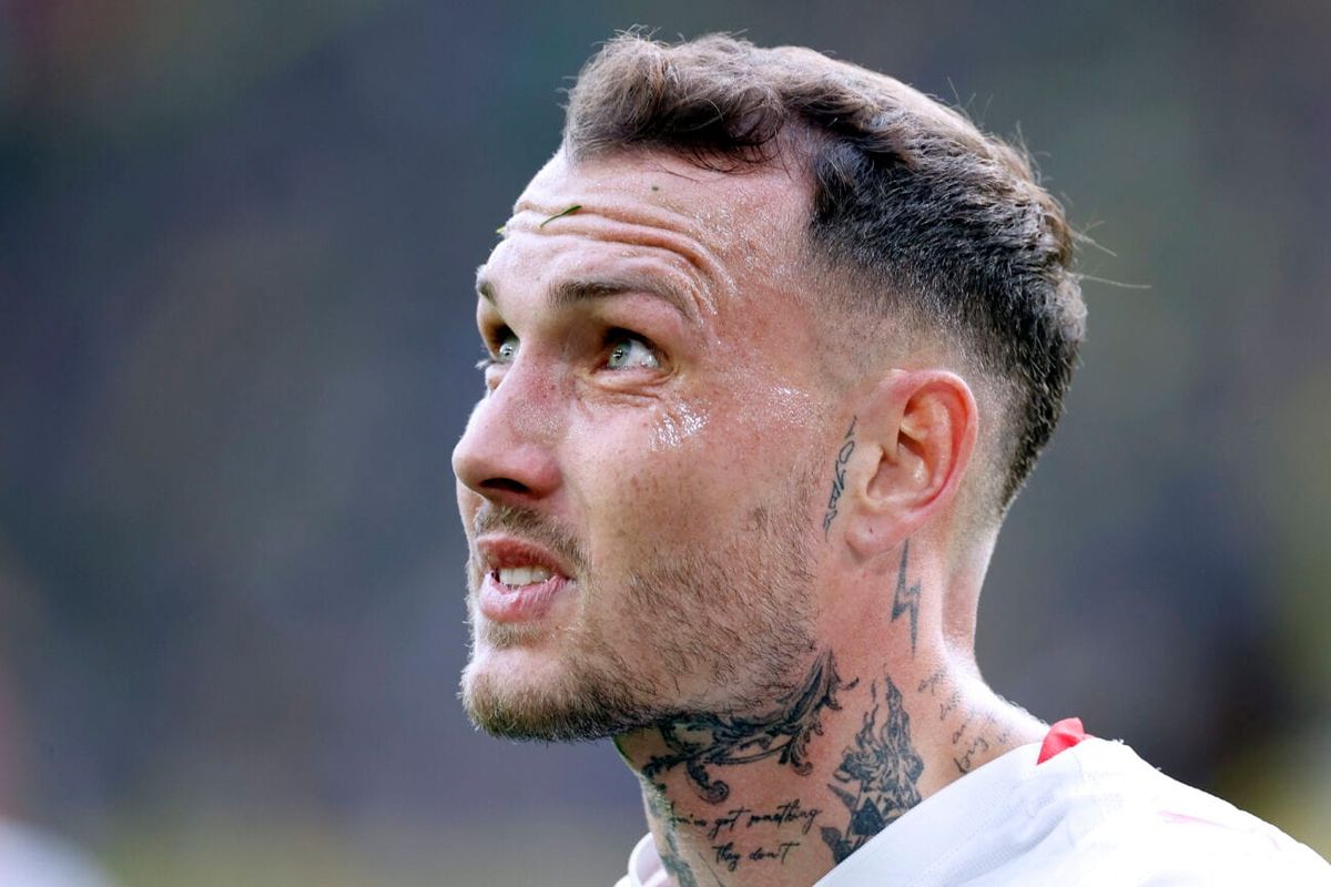David Raum tattoos: Neck bird, archangel and script details in a match close-up
