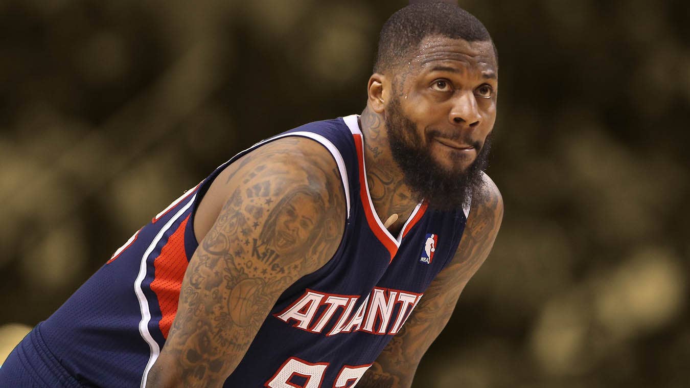 DeShawn Stevenson tattoos: clear game portrait showing neck, shoulder, and arm tattoos