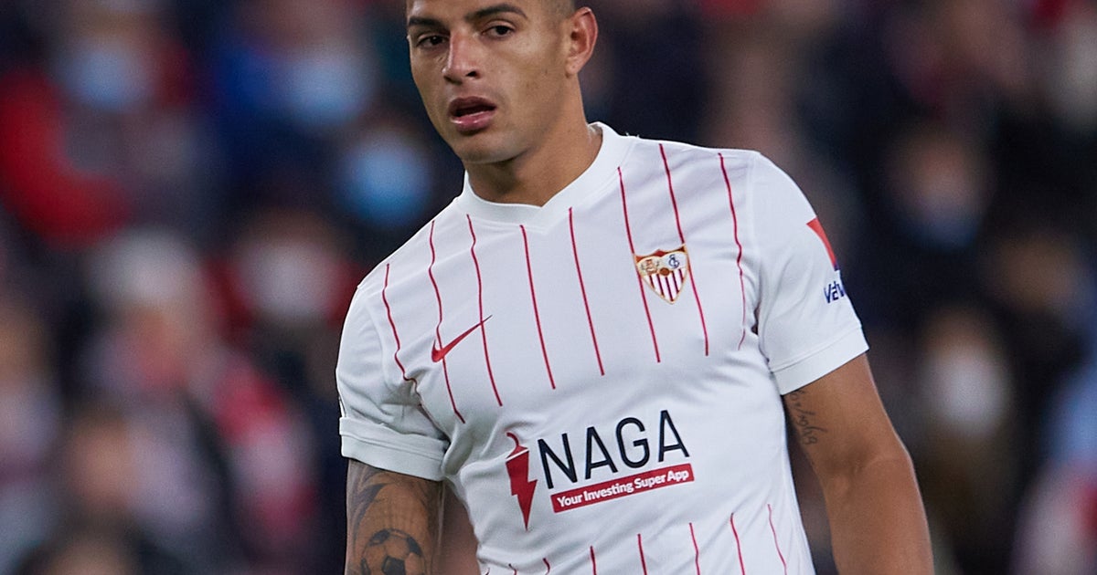 Diego Carlos tattoos: Sevilla match portrait showing the hand, wrist, neck and forearm tattoos