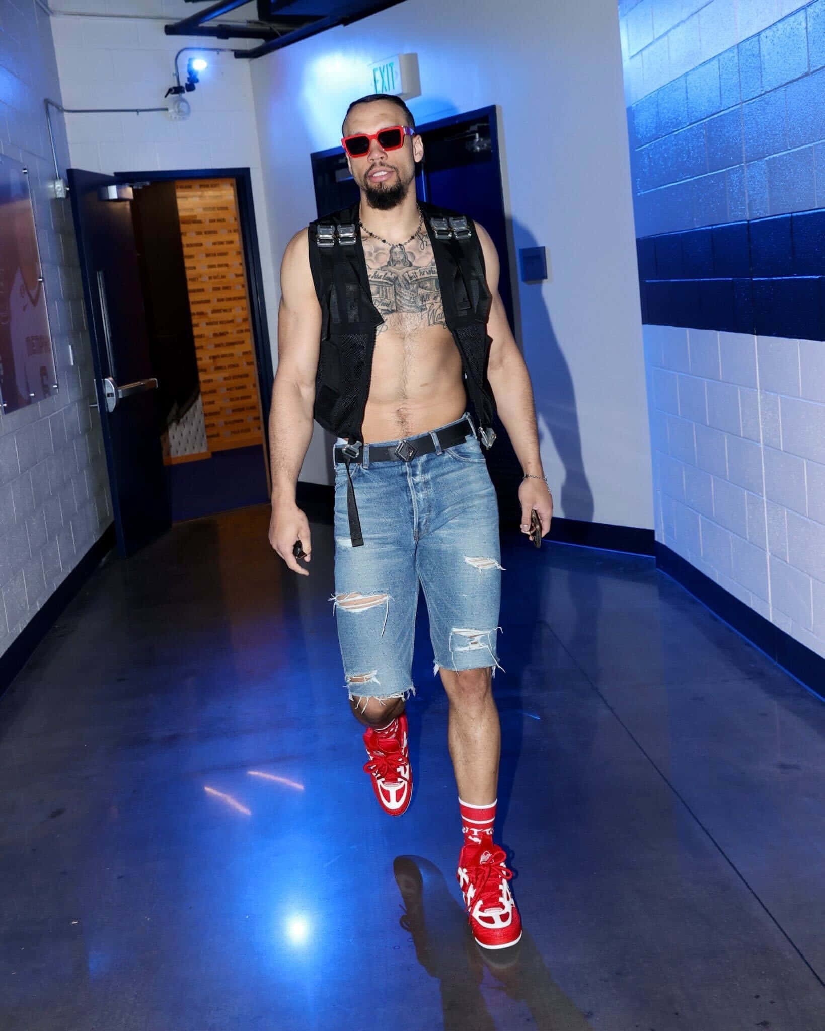 Dillon Brooks in a contextual photograph: Contextual style photograph only; not tattoo evidence for the documented Wolf Pack meaning.; not tattoo evidence