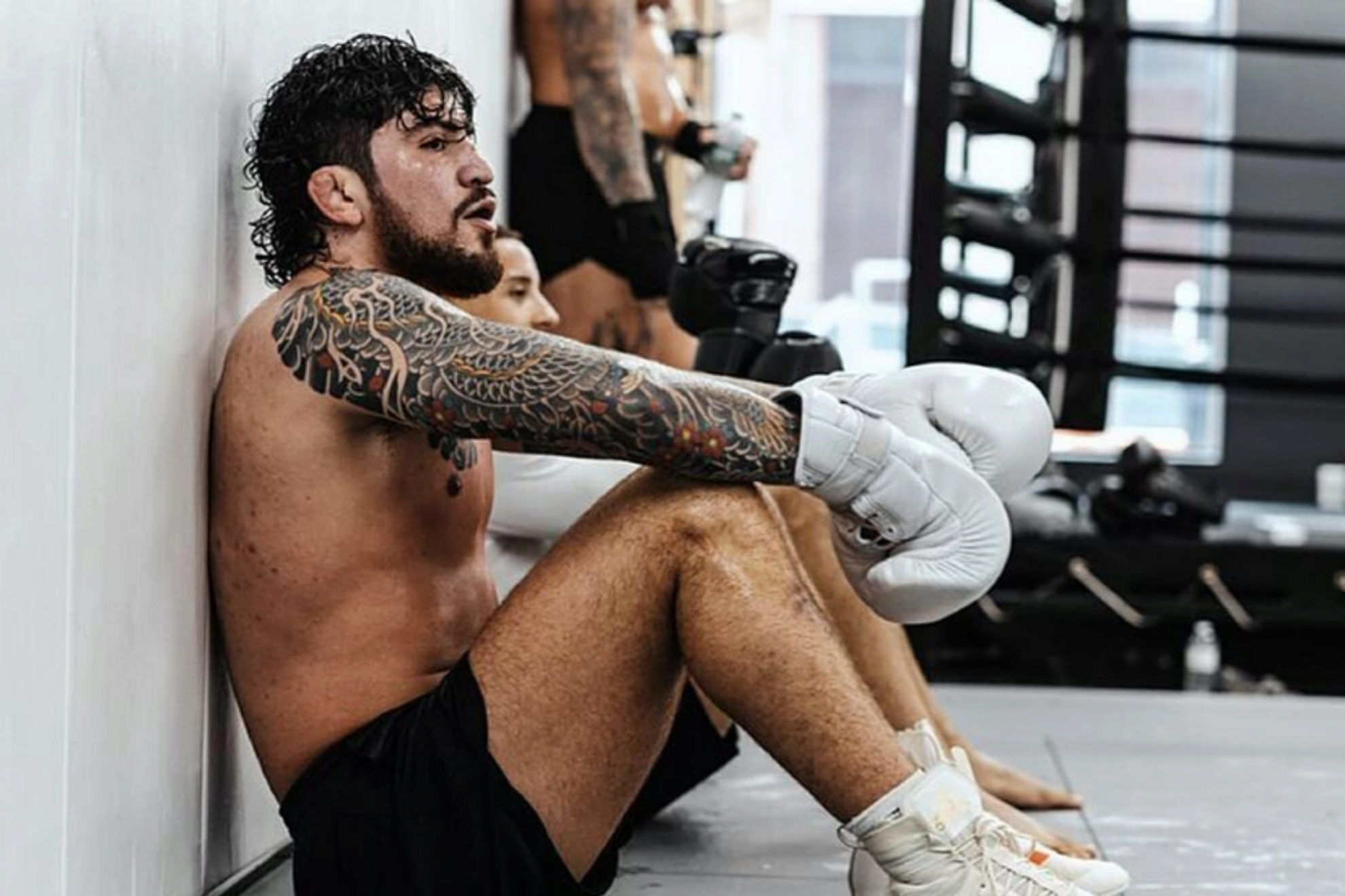 Dillon Danis showing the scales and wave work in his sleeve