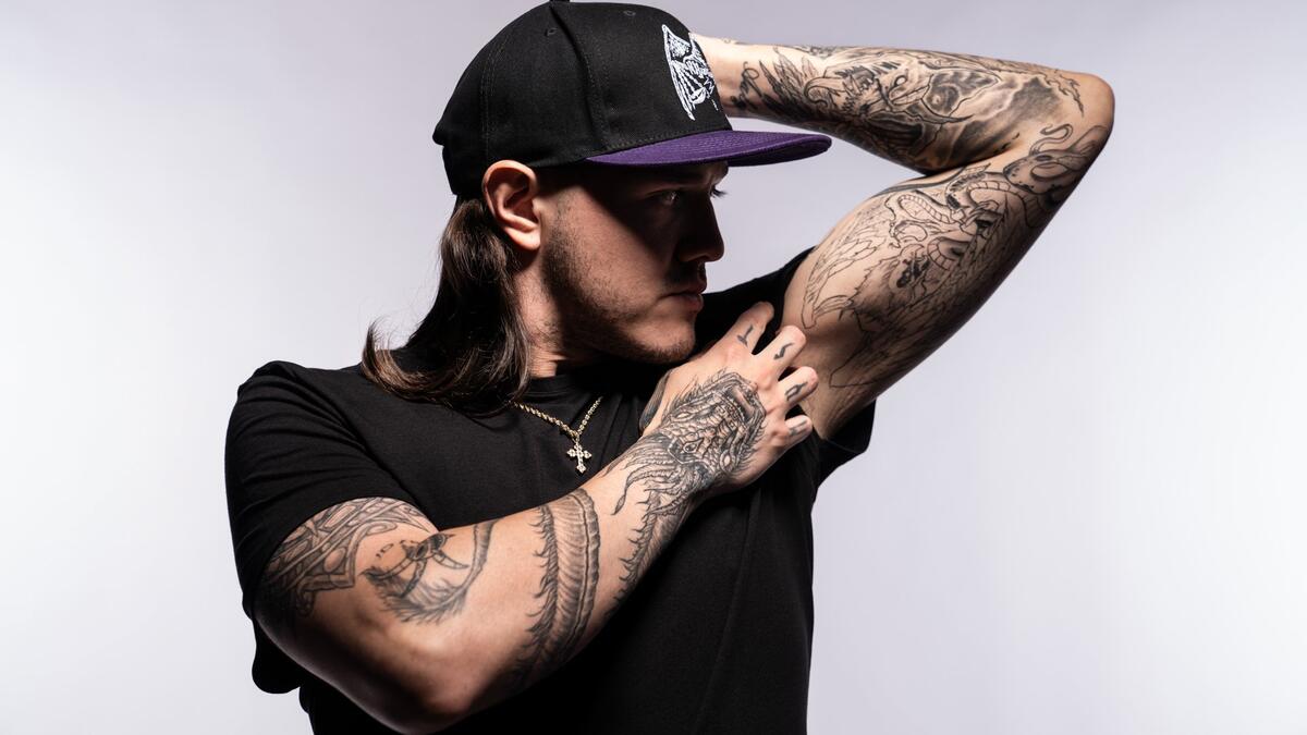 Dominik Mysterio sleeve tattoos