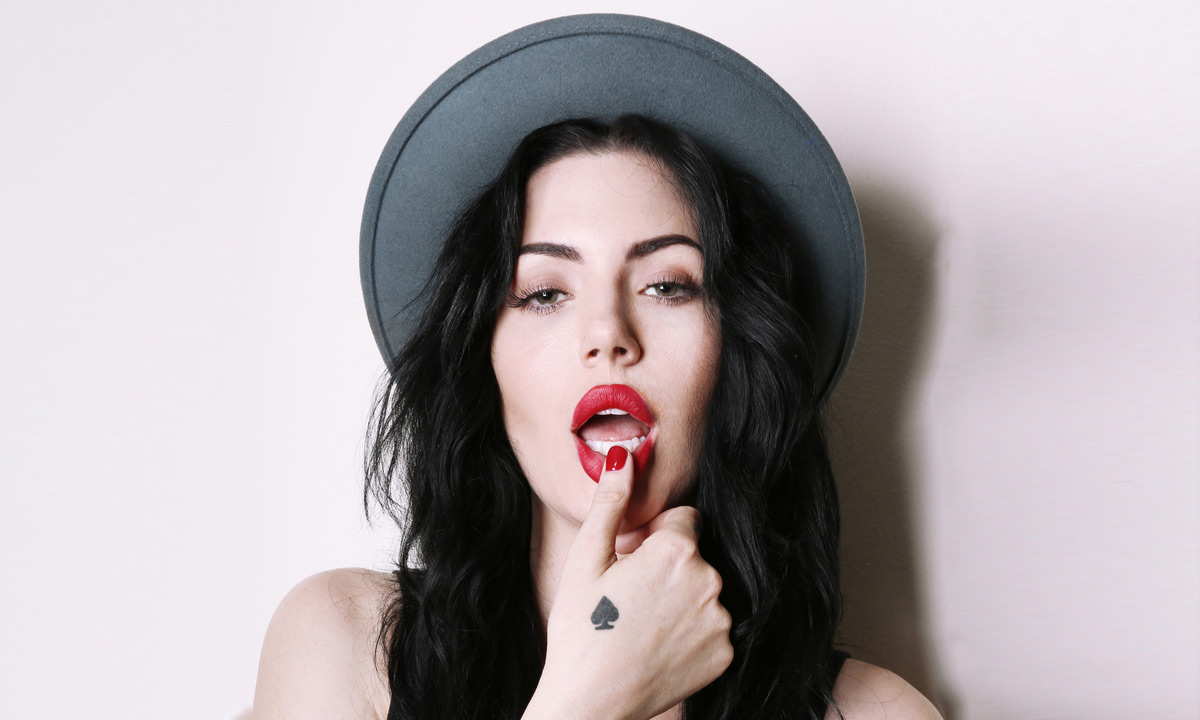 Dorothy Martin small spade hand tattoo Dorothy Martin tattoos: Inline genuine tattoo photograph