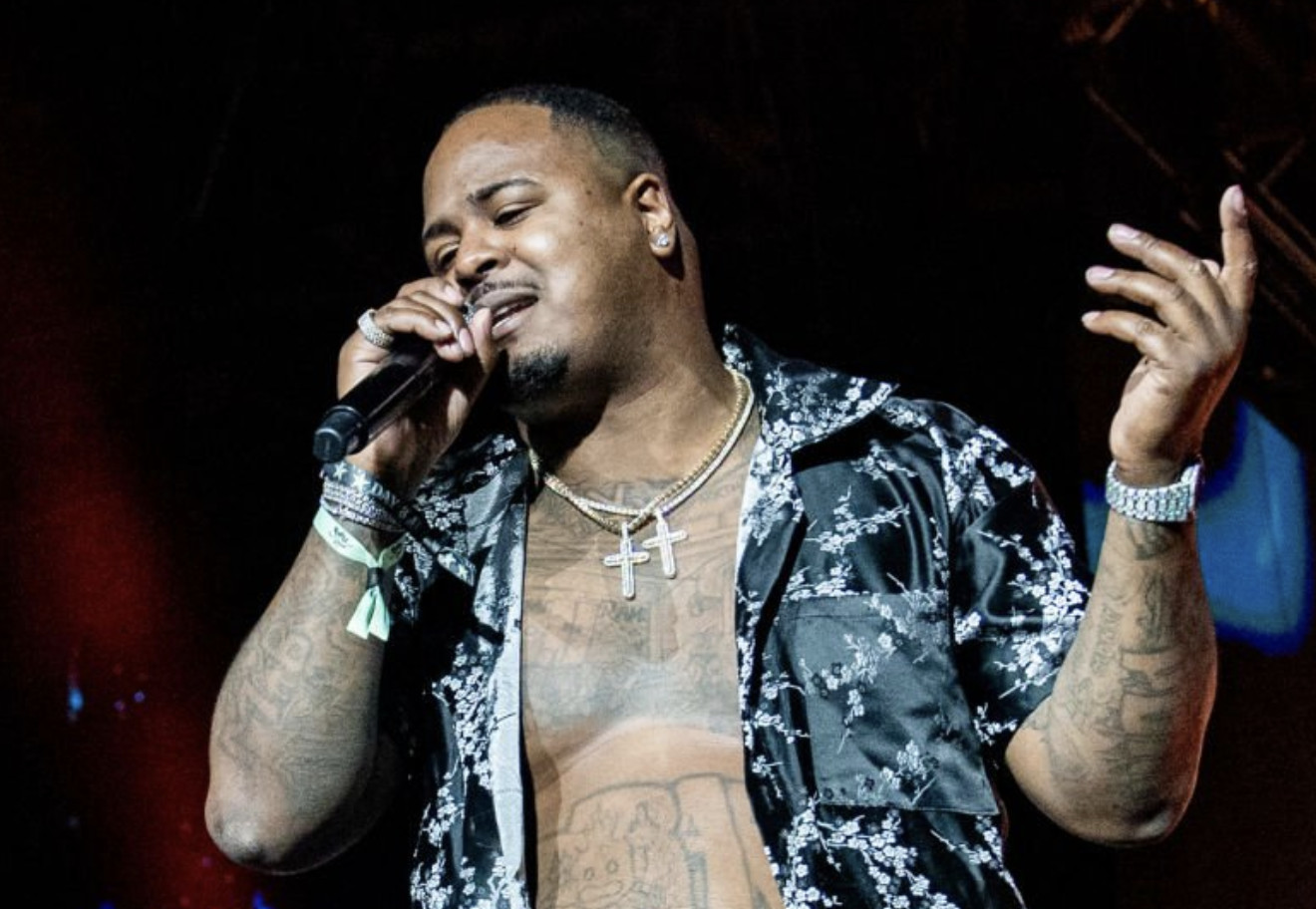 Drakeo the Ruler tattoos: chest, neck and arm tattoo frame