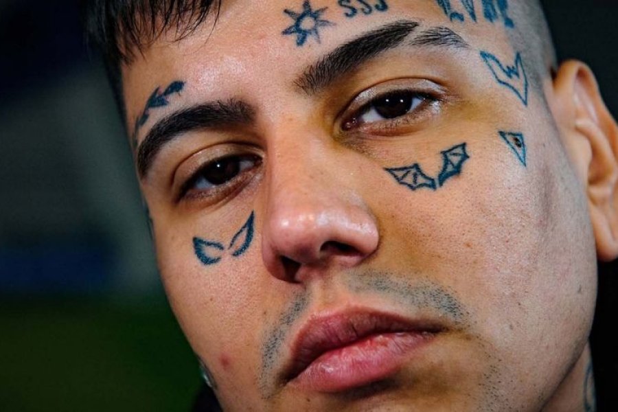 Duki tattoos: Close view of the wing and cheek symbols