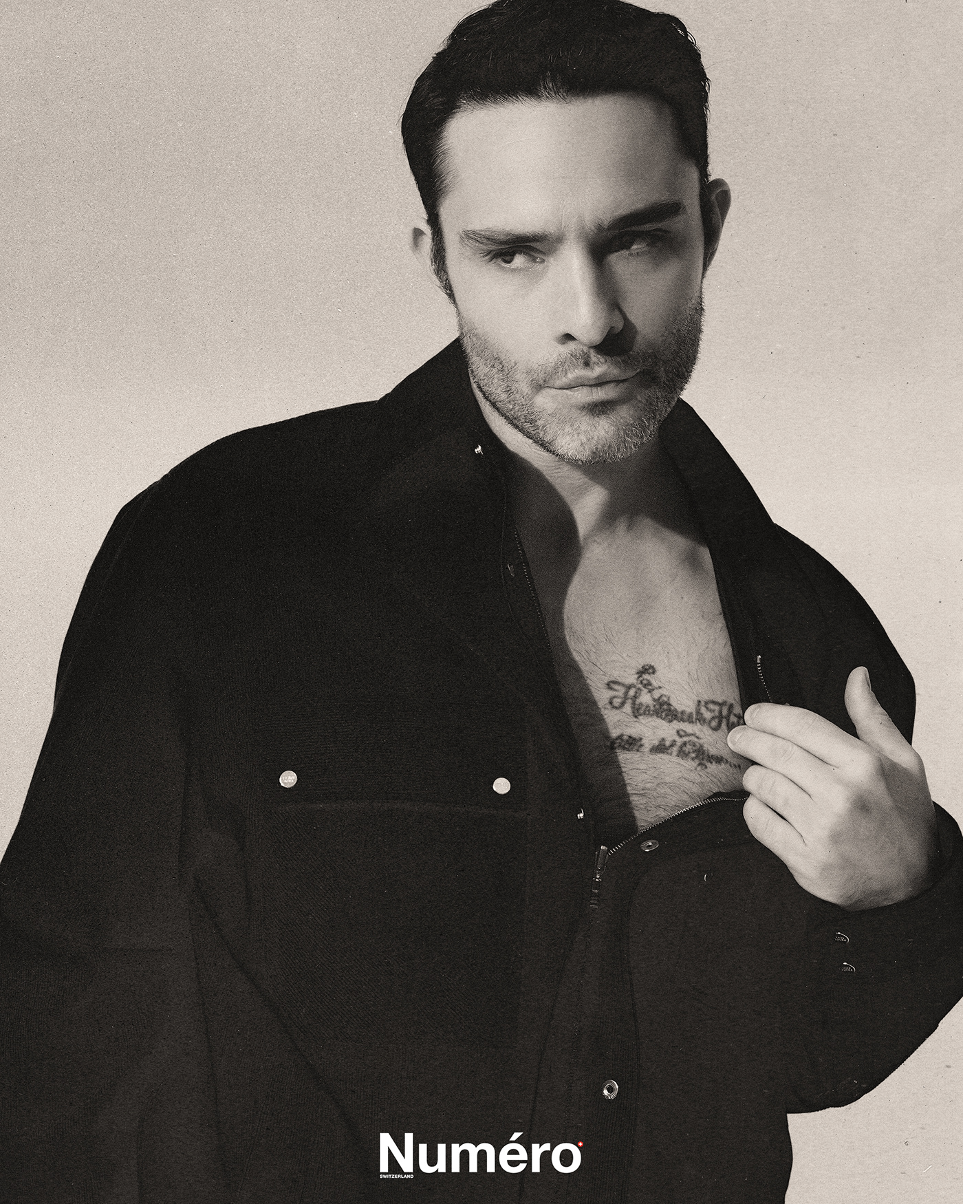 Ed Westwick tattoos: music-inspired chest and shoulder script