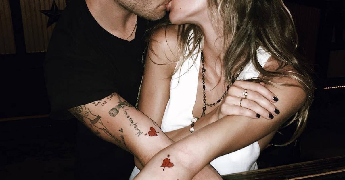 Ed Westwick tattoos: distinct heart and arrow forearm tattoo